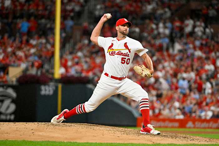 Sep 14, 2022; St. Louis, Missouri, USA; St. Louis Cardinals starting pitcher Adam Wainwright (50) pitches against the Milwaukee Brewers during the fifth inning at Busch Stadium.